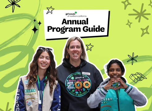 Girl Scouts Annual Program Guide 2025 with a our CEO pictured surrounded by two Girl Scouts. 
